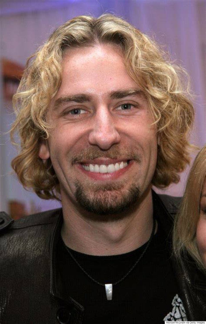 Chad Kroeger, left, and his wife, Marianne Guric, arrive at Warner