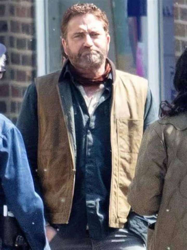 Gerard Butler and Brown Photographed on Beach