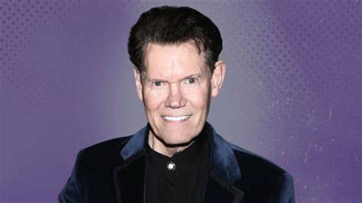 Is Randy Travis still alive?